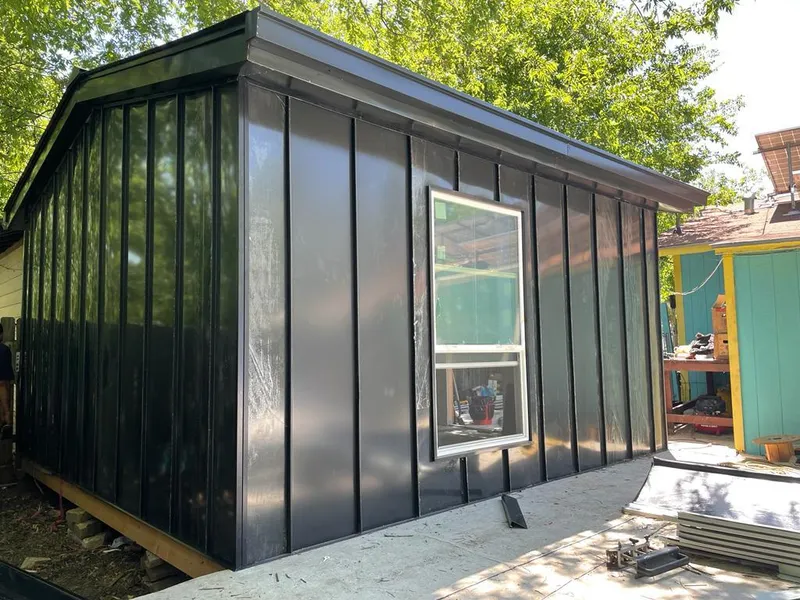 Black standing seam metal wall panels for Metal Roof Installation in Lamont